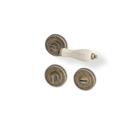 Antik R - matt bronze patina/ porcelain - Door Handle on a Round Rose