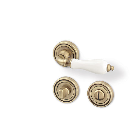 Baroque R - bronze / porcelain - Door Handle on a Round Rose