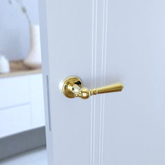 Millennium KMM G00 Brass - Door Handle on a Round Rose